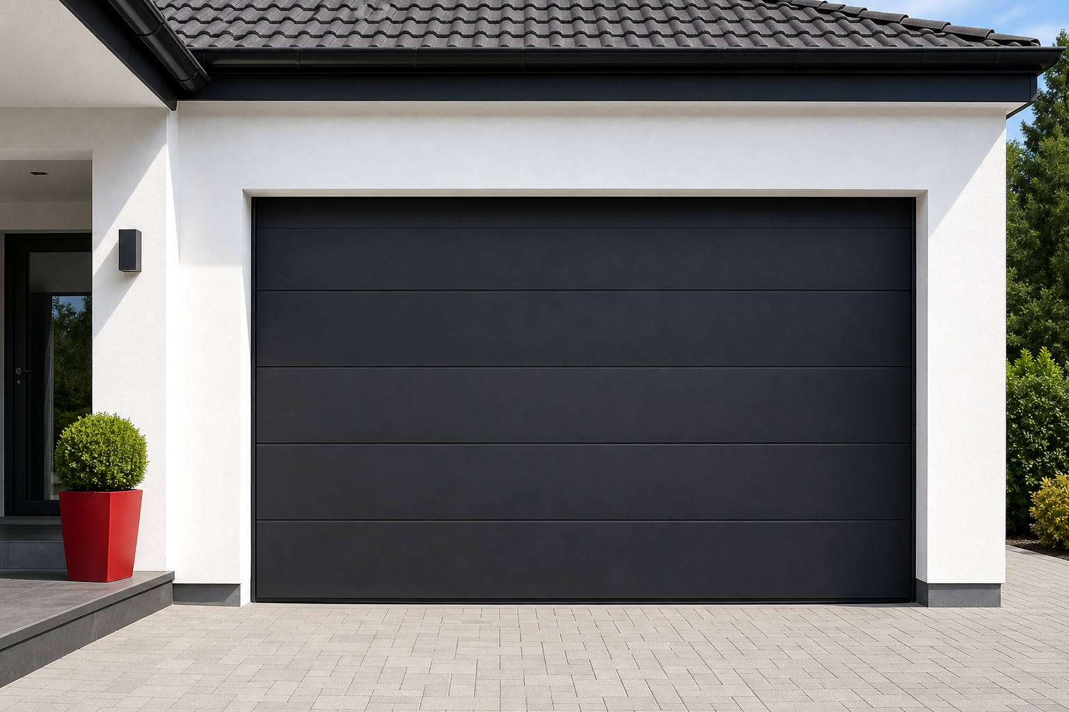 Portone sezionale grigio per garage residenziale